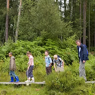 group of people exploring indiana phenology trail site
